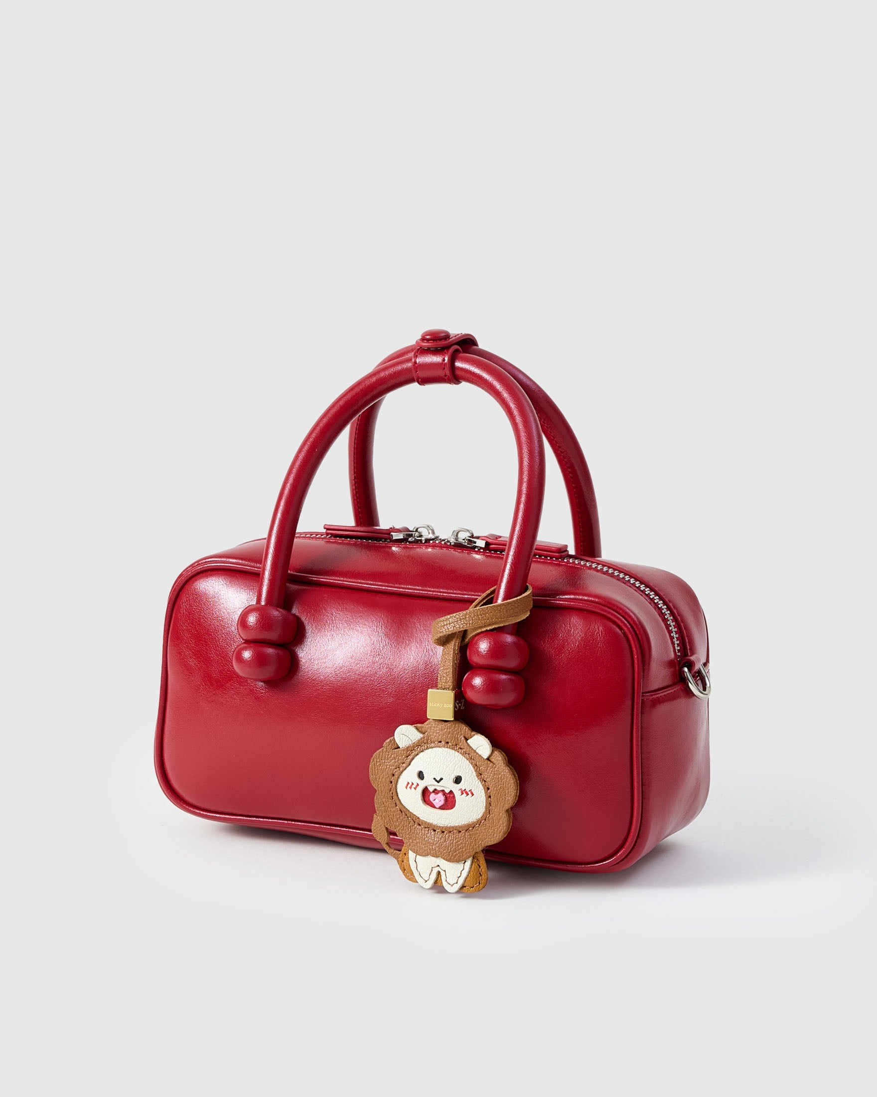 LION CHARM